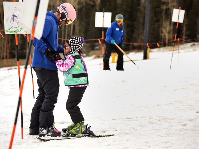 An instructor helps a young skier at Arizona Snowbowl on March 6, 2016. The resort is just outside of Flagstaff, has been in operation since 1938, making it one of the longest continually running  ...