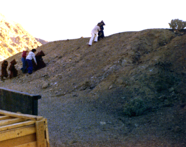 A group of children from Death Valley Elementary School are helped up a hill near Artist's Drive during filming of &quot;Star Wars&quot; in January 1977. (Sally Weber)