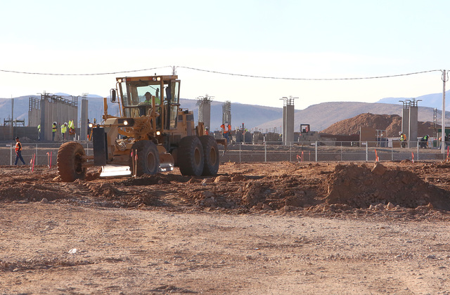 Heavy-duty, earth-moving equipment at the siteat the site where Summerlin developer Howard Hughes Corp. has plans to build an office tower next to the new NHL practice rink in Summerlin on Tuesday ...