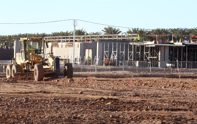 Heavy-duty, earth-moving equipment at the site at the site where Summerlin developer Howard Hughes Corp. has plans to build an office tower next to the new NHL practice rink in Summerlin on Tuesda ...