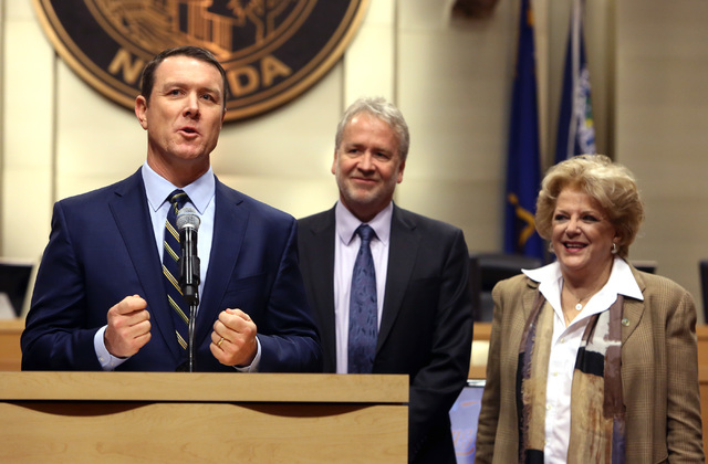 Pat Egan, NV Energy senior vice president of customer operations, joined by Las Vegas Mayor Carolyn Goodman, and Tom Perrigo, planning director and chief sustainability officer at City of Las Vega ...