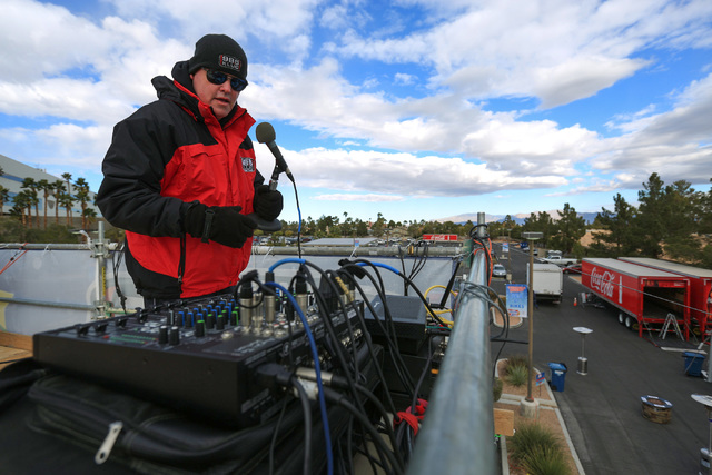 Chet Buchanan, host of 98.5 KLUC's Chet Buchanan and the Morning Zoo, hosts his radio show from a 20-foot tall scaffolding where he will spend 12 days pushing the 18th annual KLUC Toy Drive on Fri ...