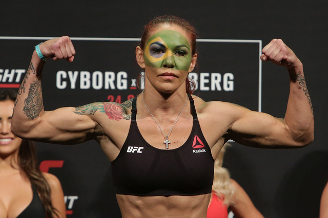 Brazil's Cristiane Justino, known as "Cris Cyborg," poses during the weigh-in for her UFC Fight Night in Brasilia, Brazil, Friday, Sept. 23, 2016. (Eraldo Peres/AP)