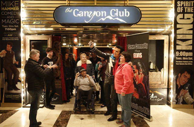 Steve Connolly takes a selfie with Teffany Gilbert (cq), of San Luis Obispo, Calif., following his performance as Elvis in "Spirit of the King" at Four Queens hotel-casino on Sat ...