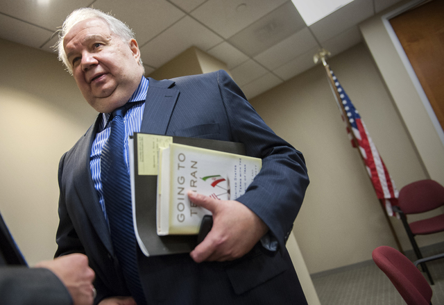 In this Sept. 6, 2013 file photo, Russia's ambassador to the U.S. Sergey Kislyak, speaks with reporters in Washington. The Obama administration is aware of frequent contacts between President-elec ...