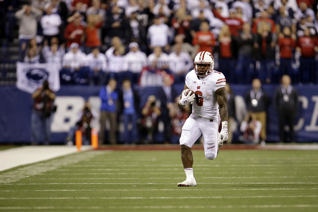Wisconsin running back Corey Clement runs with the ball during the second half of the Big Ten championship NCAA college football game against Penn State, Saturday, Dec. 3, 2016, in Indianapolis. ( ...