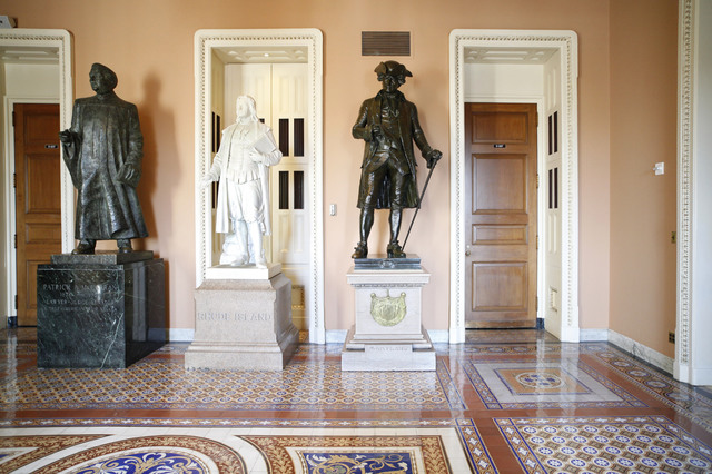 A statue of Patrick A. McCarran of Nevada, left, stands next to ones of Roger Williams of Rhode Island and John Hanson of Maryland near the entrance to the Senate floor on Capitol Hill in Washingt ...
