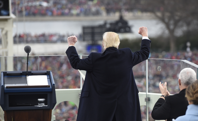 President Donald Trump celebrates after his speech during the presidential inauguration on Capitol Hill in Washington, Friday, Jan. 20, 2017. (Saul Loeb/Pool Photo via AP)
