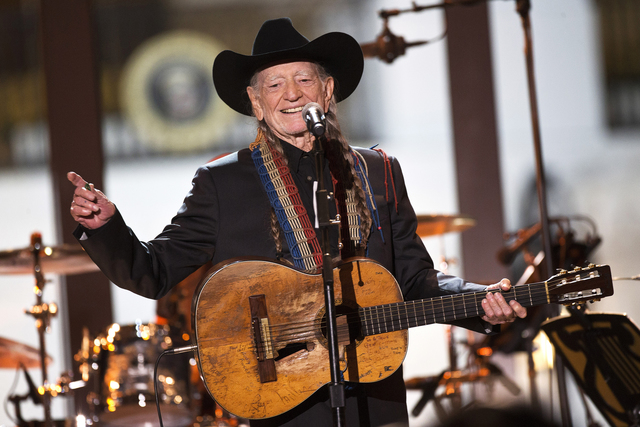 Singer Willie Nelson performs during an “In Performance at the White House” series event on the South Lawn of the White House, Thursday, Nov. 6, 2014, in Washington. (AP Photo/Jacquelyn Martin)