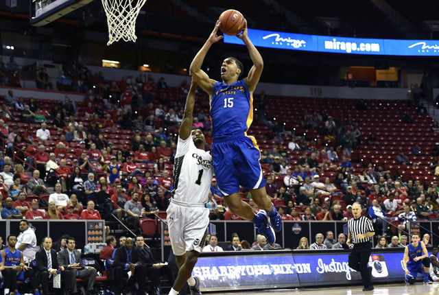 San Jose State's Brandon Clarke (15) shoots against Colorado State's Antwan Scott (1) during the second half of an NCAA college basketball game at the Mountain West Conference men's tournament Wed ...
