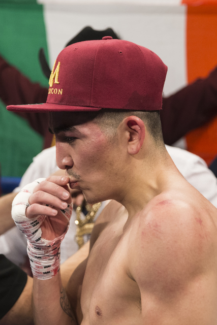 Leo Santa Cruz reacts after his fight against Carl Frampton in the WBA Featherweight Championship bout at MGM Grand Garden Arena on Saturday, Jan. 28, 2017, in Las Vegas. Santa Cruz won by split d ...