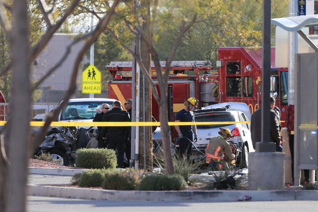North Las Vegas police and Las Vegas fire fighters work the scene of a crash on Martin Luther King Boulevard near Carey Avenue on Friday, Jan. 6, 2017. Brett Le Blanc/Las Vegas Review-Journal Foll ...