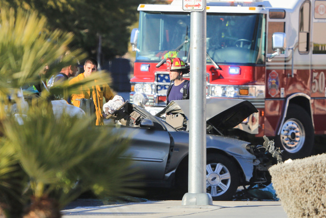 North Las Vegas police and Las Vegas fire fighters work the scene of a crash on Martin Luther King Boulevard near Carey Avenue on Friday, Jan. 6, 2017. Brett Le Blanc/Las Vegas Review-Journal Foll ...