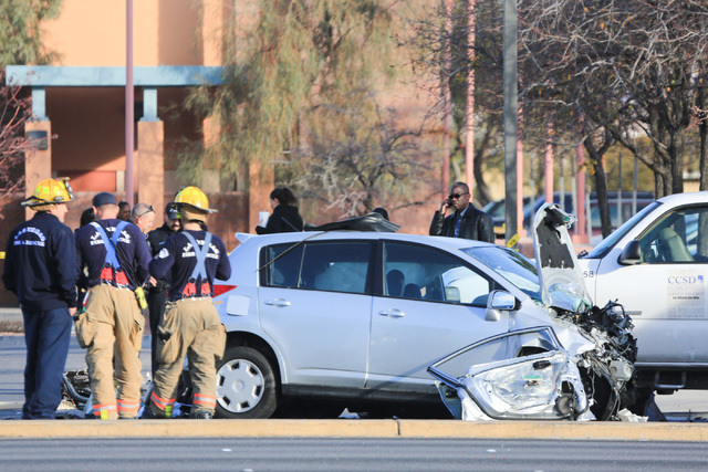 North Las Vegas police and Las Vegas fire fighters work the scene of a crash on Martin Luther King Boulevard near Carey Avenue on Friday, Jan. 6, 2017. Brett Le Blanc/Las Vegas Review-Journal Foll ...