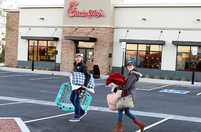Taylor Ball, left, and his wife, Janae, arrive at Chick-fil-A at 9925 S. Eastern Ave. in Henderson to camp outside the restaurant for the chance to win free meal for a year on Wednesday, Jan. 25,  ...
