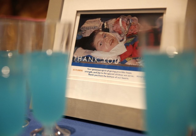 A framed image of Allie Gardner sits on a reception table at the Gardner family home, Thursday, Jan. 12, 2017, in Las Vegas. Make-A-Wish Southern Nevada and its partners formally revealed the Gard ...