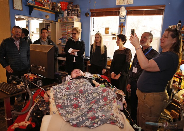 Sandy Gardner, right, live streams at the Gardner family home, Thursday, Jan. 12, 2017 in Las Vegas. Make-A-Wish Southern Nevada and its partners formally revealed the Gardner family's long-awaite ...