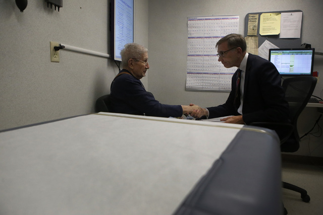 Terry Vantaggi, 74, left, shakes Dr. Nicholas Vogelzang hand after an appointment at the Comprehensive Cancer Centers of Nevada on Thursday, Jan. 05, 2017, in Las Vegas. Vanteggi is a patient of D ...