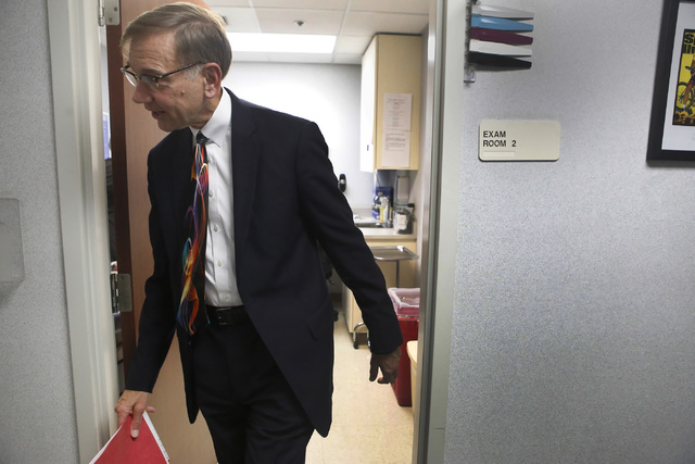 Dr. Nicholas Vogelzang walks out of a room after an appointment at the Comprehensive Cancer Centers of Nevada on Thursday, Jan. 05, 2017, in Las Vegas. Vanteggi is a patient of Dr. Vogelzang. (Chr ...