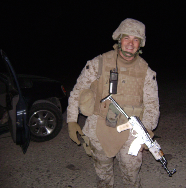 Marine Matt Shepard holds a silver-and-ivory AK-47 rifle his unit  confiscated in November 2007 in Anbar province, Iraq. (Courtesy Matt  Shepard) | Las Vegas Review-Journal