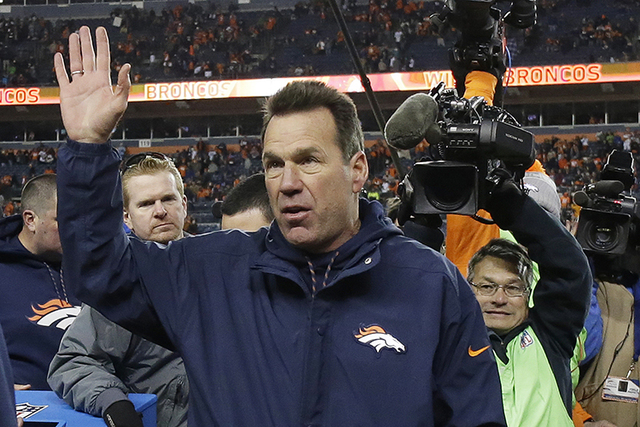 Denver Broncos coach Gary Kubiak waves as he walks off the field after the team's NFL football game against the Oakland Raiders, Sunday, Jan. 1, 2017, in Denver. The Broncos won, 24-6. (Jack Demps ...