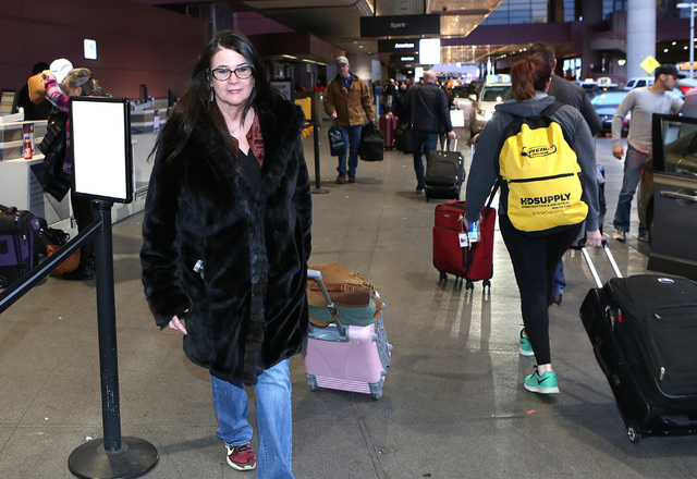Claudia Keelan arrives at McCarran International Airport on Thursday, Jan. 19, 2017, in Las Vegas. Keelan departs for  District of Columbia to participate in the Women's March in Washington. (Bizu ...
