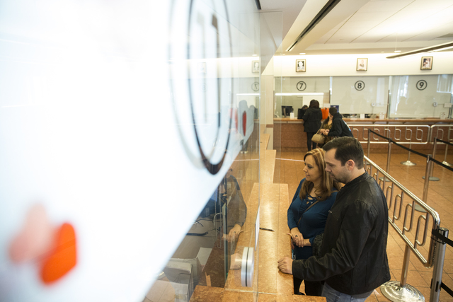 Brittney McDaniel, left, and Terry Sleister of Georgia complete their marriage license at the Clark County Marriage License Bureau on Friday, Jan. 13, 2017, in Las Vegas. Erik Verduzco/Las Vegas R ...