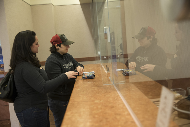 Greta Guilbault, left, and Adriana Minacapilli of Rhode Island complete their marriage license at the Clark County Marriage License Bureau on Friday, Jan. 13, 2017, in Las Vegas. Erik Verduzco/Las ...