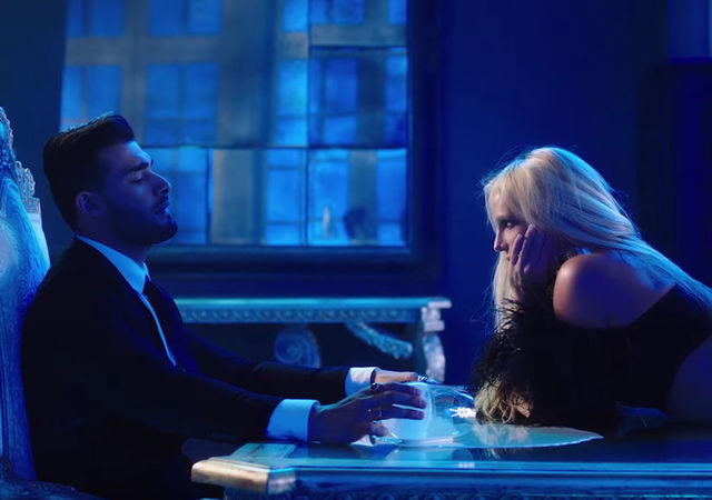 Sam Asghari and Britney Spears appear in the music video for Spears' "Slumber Party."