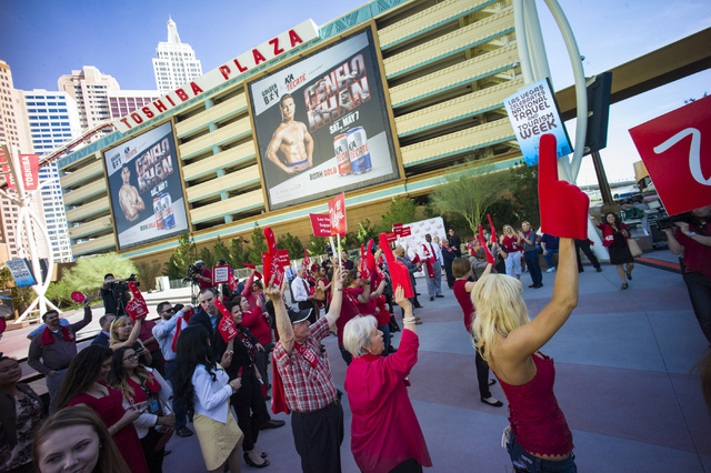 Attendees cheer during a rally celebrating National Travel & Tourism Week at Toshiba Plaza in Las Vegas on Tuesday, May 3, 2016. Chase Stevens/Las Vegas Review-Journal Follow @csstevensphoto