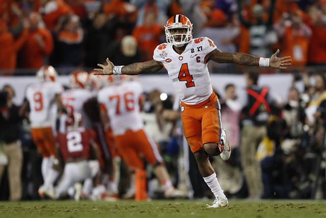 Clemson's Deshaun Watson celebrates a last second touchdown pass to Hunter Renfrow during the second half of the NCAA college football playoff championship game against Alabama Tuesday, Jan. 10, 2 ...