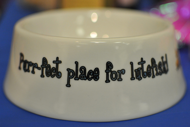 Lutefisk-themed pet-food bowls were among the many mementos sold at the  dinner. BRIAN SANDFORD/VIEW FOLLOW @NWEDITOR | Las Vegas Review-Journal