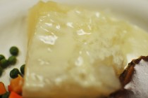 Lutefisk, known for its gelatinous consistency, is seen up close during the early lutefisk dinn ...