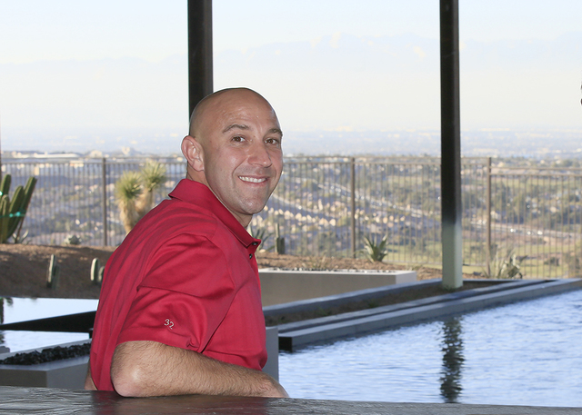 John Miller enjoys the views of the Las Vegas Strip from his new Ascaya home. (Elke Cote/Real Estate Millions)