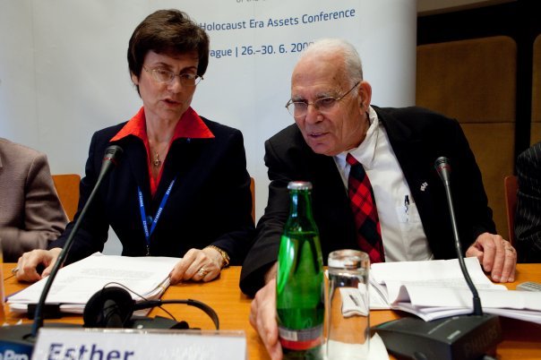 Esther Finder, right, speaks in 2009 at the Holocaust Era Assets Conference in Prague. (Courtesy)
