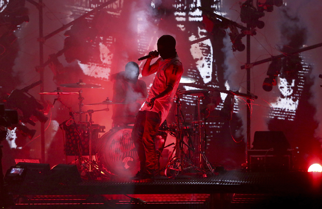 Twenty One Pilots perform a medley at the American Music Awards at the Microsoft Theater on Sunday, Nov. 20, 2016, in Los Angeles. (Matt Sayles/Invision/AP)