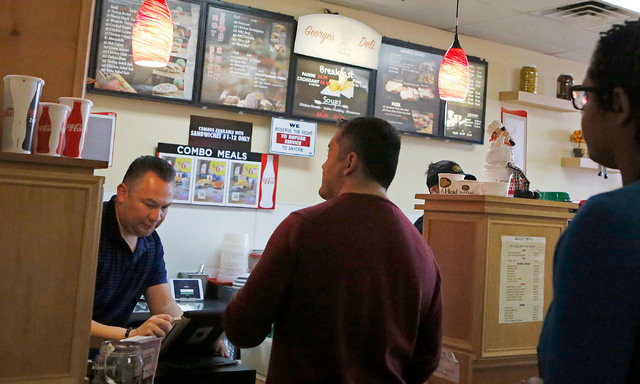 Luis Escobar, 42, left, takes customer orders at the George's Italian Deli on Friday, Feb. 3, 2017, in Las Vegas. (Christian K. Lee/Las Vegas Review-Journal) @chrisklee_jpeg