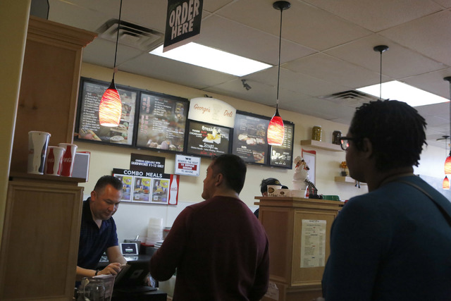 Luis Escobar, 42, left, takes customer orders at the George's Italian Deli on Friday, Feb. 3, 2017, in Las Vegas. (Christian K. Lee/Las Vegas Review-Journal) @chrisklee_jpeg