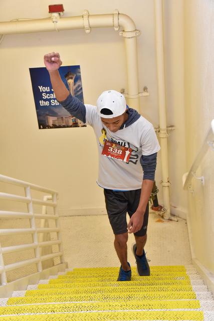 Christion Johnson finishes the last few steps of his climb at the Stratosphere. (Courtesy: Cashman Photo)