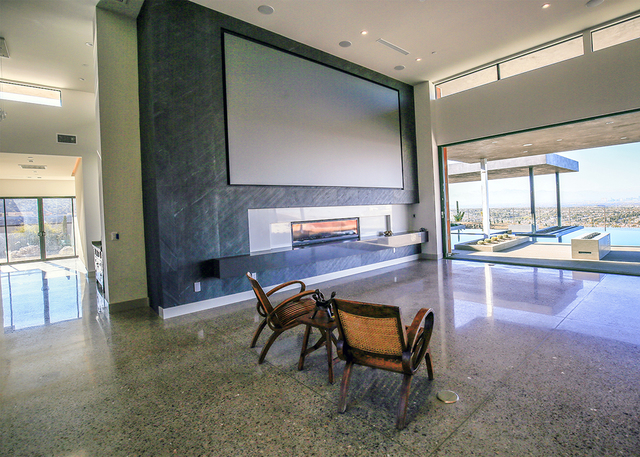 John Miller is a sports fan so there are a lot of large TV screens in the home. (Elke Cote/Real Estate Millions)