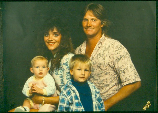 Randi Evers, bottom right; his father, Mike Evers; his stepmother, Tina Evers; and his younger sister (RJ file photo)
