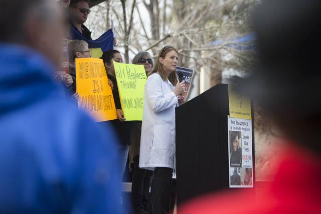 Dr. Joanne Levy of Las Vegas speaks in front of health care advocates protesting changes to the Affordable Care Act during a rally at Heritage Park on Saturday, Feb. 25, 2017, in Las Vegas. (Erik ...