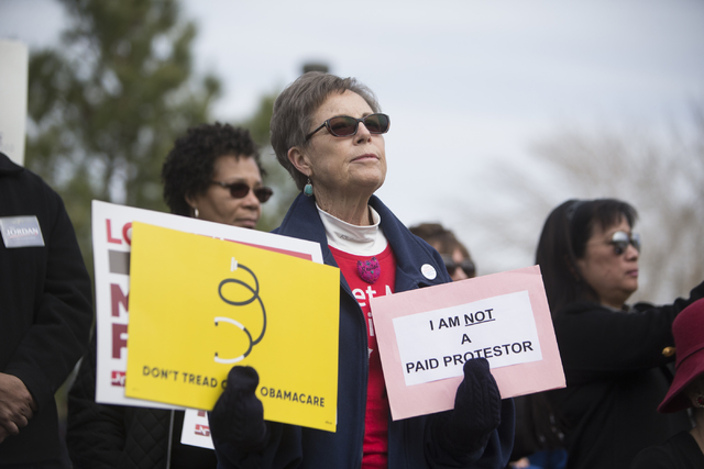 Jeannine Spicer participates during a rally with other health care advocates protesting changes to the Affordable Care Act at Heritage Park on Saturday, Feb. 25, 2017, in Las Vegas. (Erik Verduzco ...