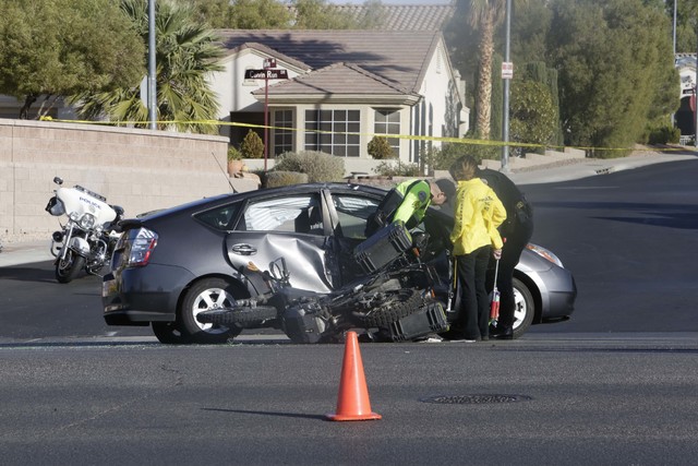 Henderson Police investigate a fatal crash involving a motorcycle and car at Sun City Anthem Drive and Thunder Bay Avenue in Henderson on Dec. 6, 2016. (Bizuayehu Tesfaye/Las Vegas Review-Journal) ...