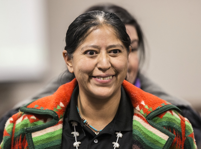 Raquel Arthur greets friends before the start of a Senate Government Affairs Committee meeting to discuss a resolution to replace Columbus Day with Indigenous People Day at the Nevada Legislative  ...