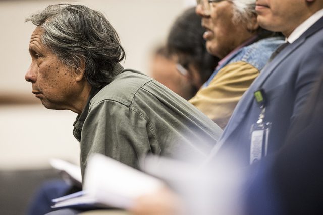 Joe Bryan, a member of the Washoe Tribe, listens to officials on the Senate Government Affairs Committee discuss a resolution to replace Columbus Day with Indigenous People Day at the Nevada Legis ...