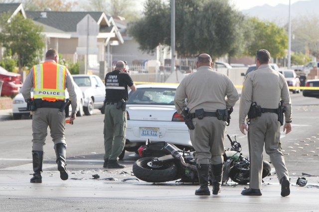 Las Vegas police investigate a crash between a motorcycle and a car at Pecos and Gowan roads on March 2, 2016, in North Las Vegas. Bizuayehu Tesfaye/Las Vegas Review-Journal Follow @bizutesfaye