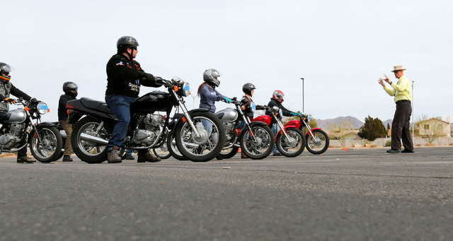 Instructor Mike "Pilot" Nelson, right, talks with participants during a College of Southern Nevada motorcycle safety course at the college's Henderson campus on Sunday, Feb. 5, 2017. (Chitose Suzu ...