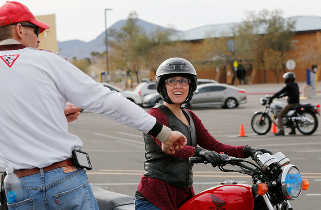 Kenzy Brooks of North Las Vegas listens to instructor Patrick Soles during a College of Southern Nevada motorcycle safety course at the college's Henderson campus on Sunday, Feb. 5, 2017. (Chitose ...