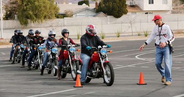 Instructor Patrick Soles, right, directs participants during a College of Southern Nevada motorcycle safety course at the college's Henderson campus on Sunday, Feb. 5, 2017. (Chitose Suzuki/Las Ve ...